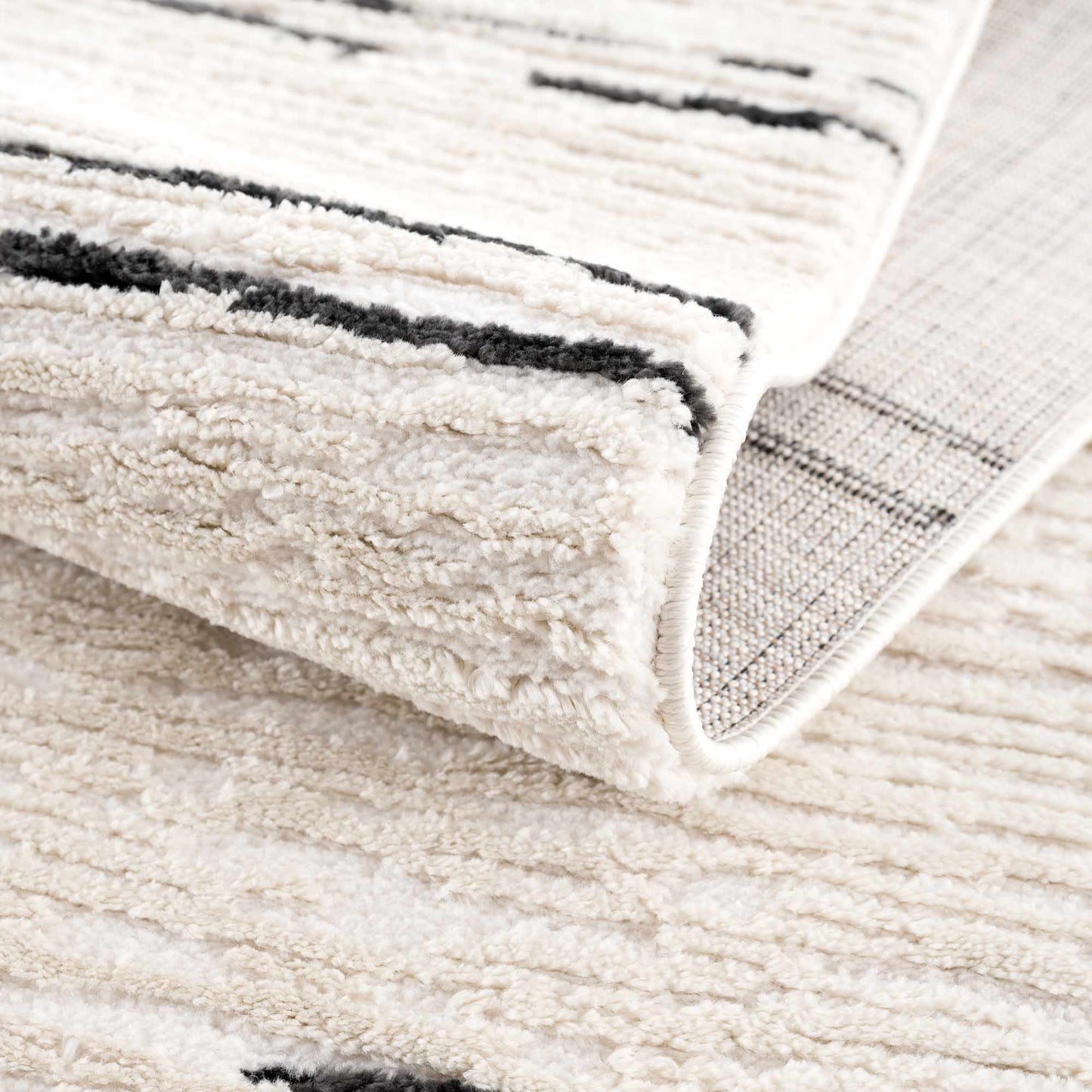 Riad Black Striped White Rug with Tassels - MyTuftedRugs.com