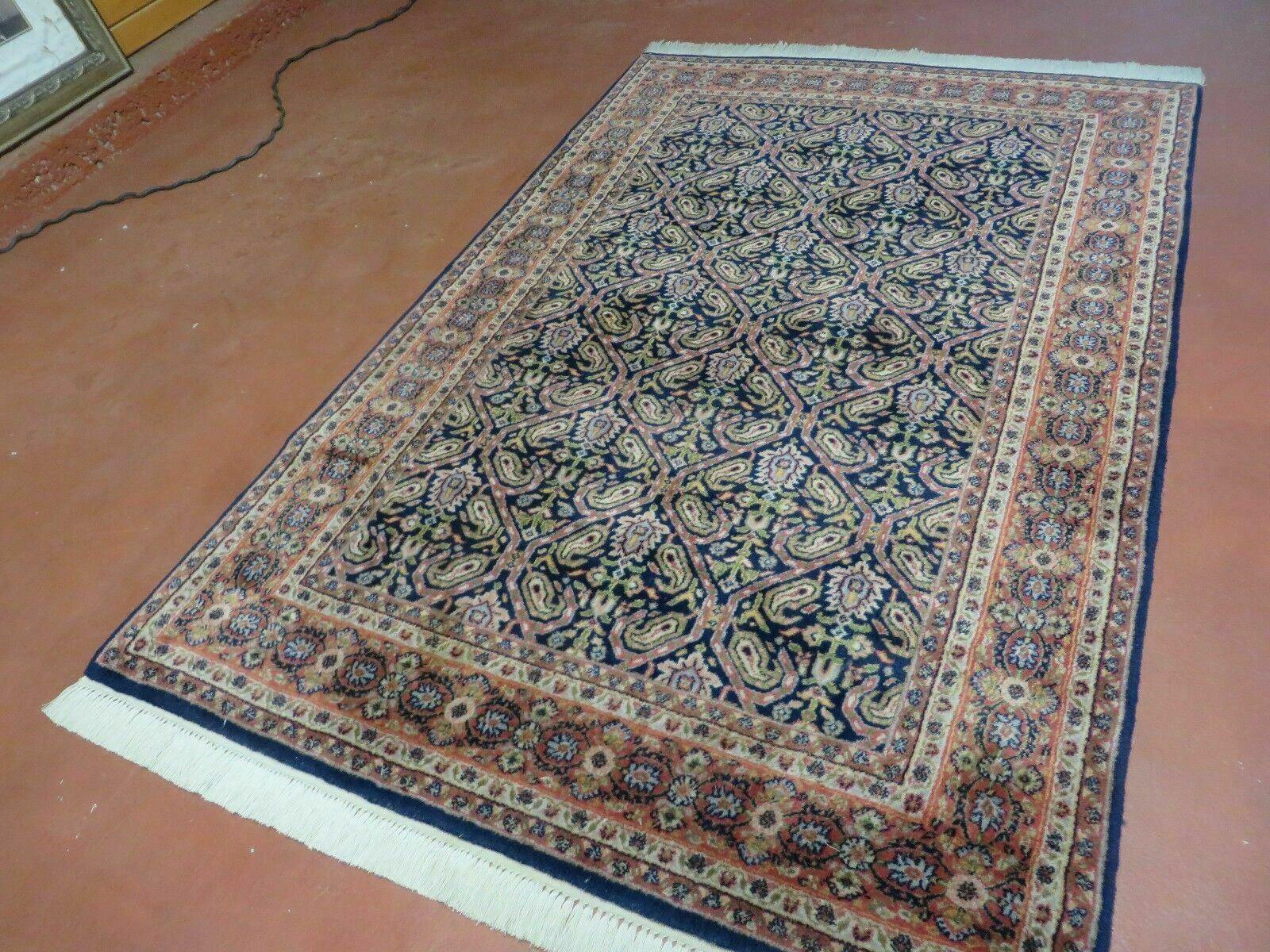 Vintage 1970s Handmade Wool Rug | 3'11" x 5'10" Hand-Knotted