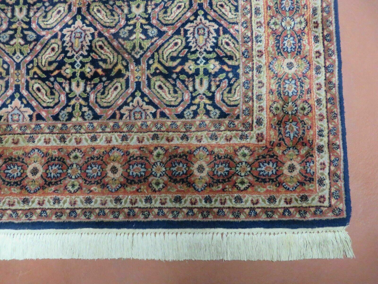 Vintage 1970s Handmade Wool Rug | 3'11" x 5'10" Hand-Knotted