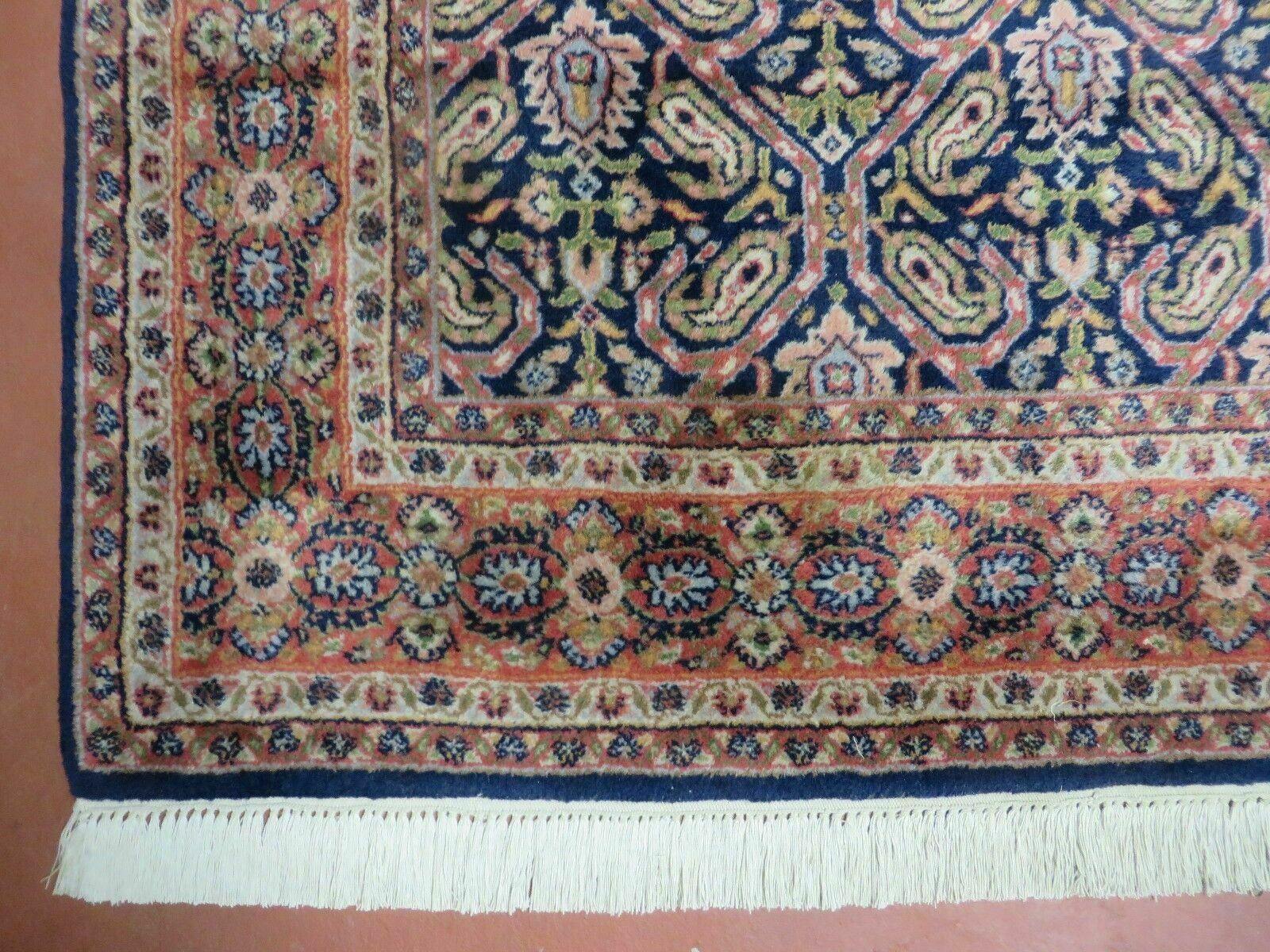 Vintage 1970s Handmade Wool Rug | 3'11" x 5'10" Hand-Knotted