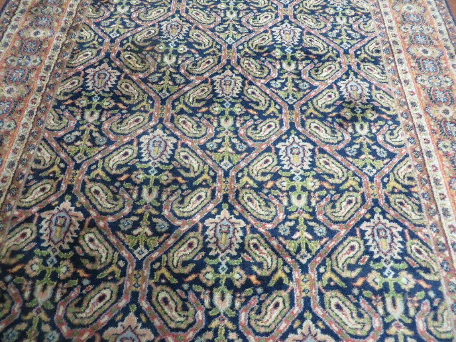 Vintage 1970s Handmade Wool Rug | 3'11" x 5'10" Hand-Knotted
