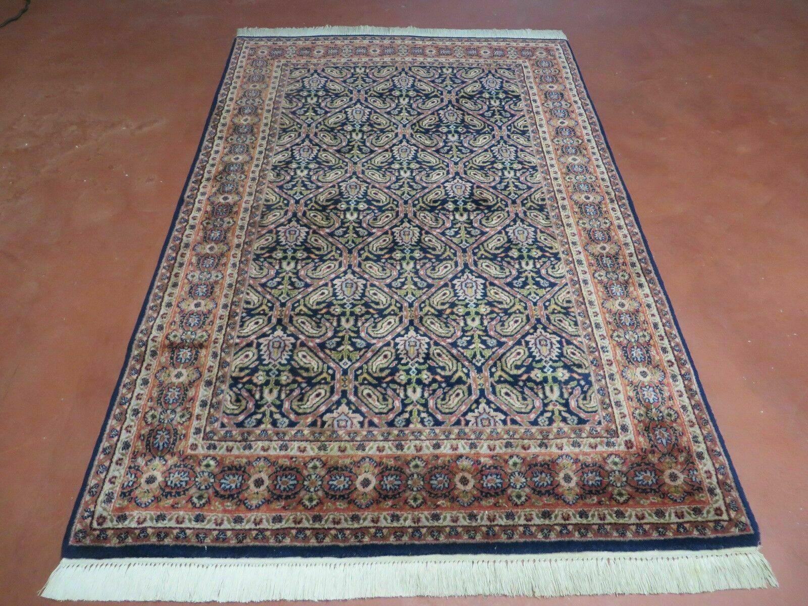 Vintage 1970s Handmade Wool Rug | 3'11" x 5'10" Hand-Knotted