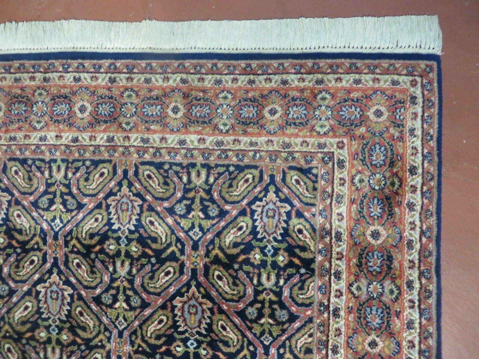 Vintage 1970s Handmade Wool Rug | 3'11" x 5'10" Hand-Knotted