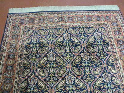 Vintage 1970s Handmade Wool Rug | 3'11" x 5'10" Hand-Knotted